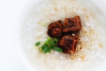 Chinese food, spicy beef jerky on rice porridge with copy space