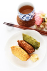 Japanese food, assorted inari-zushi rice and tofu skin on dish,
