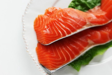 Freshness salmon fish fillet on lettuce for prepared ingredient