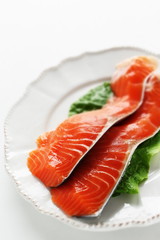 Freshness salmon fish fillet on lettuce for prepared ingredient