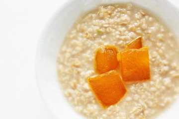 Healthy breakfast, dried mango and oat celery grain in bowl