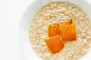 Healthy breakfast, dried mango and oat celery grain in bowl