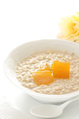 Healthy breakfast, dried mango and oat celery grain in bowl