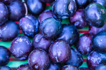 Plum background in the market; Food Background