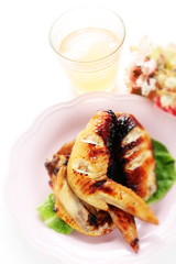 Chinese food,  barbecue and honey chicken on lettuce