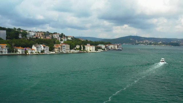 Istanbul Bosphorus Waterside House and Boat Passing Aerial View 3