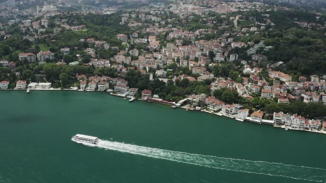 Istanbul Bosphorus Waterside House and Boat Passing Aerial View