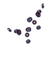Large Amount of Ball Bearings Falling in Bulk Isolated Over White Background.