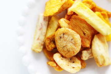 Dried and salted fruit and vegetable on dish