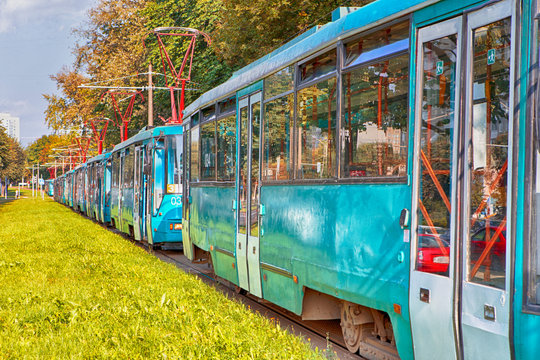 Public Transport Accidents. Line of Tramways Stuck in City Jam at Daytime.