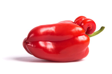 Ugly shaped organic vegetables. Deformed homegrown bell pepper isolated on white background