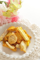 Dried and salted fruit and vegetable on dish