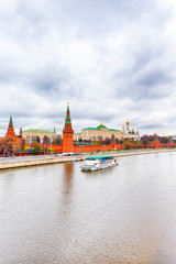 Obraz premium Russia Travel Destinations. Moscow Kremlin on Moskva River During Daytime. View from Bridge In Cloudy Day.