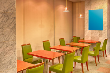 Line of Green Leather Chairs Located Inside of The Dining Room