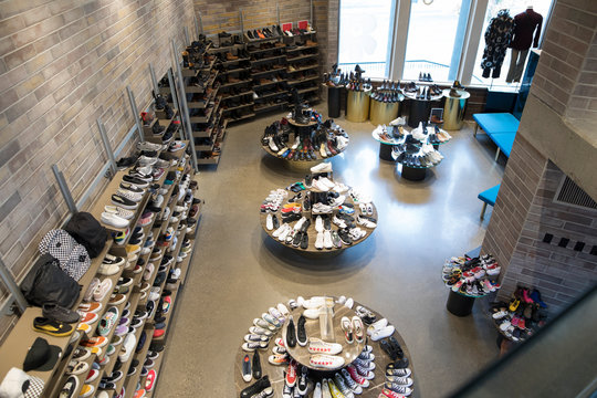 High Angle View Of Footwear For Sale In Boutique Shoe Store