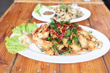Food in a Thai restaurant Made from meat and vegetables on wooden table