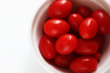 Freshness mini tomato on dish with copy space 