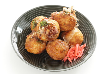 Japanese food, takoyaki octopus ball on dish and sauce