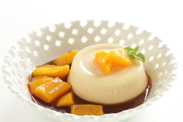 Caramel sauce and pudding with copy space