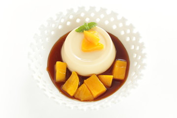 Caramel sauce and pudding with copy space