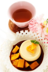 Caramel sauce and pudding with copy space