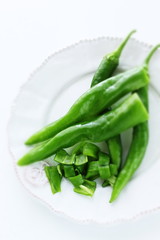 Japanese green pepper on plate for cooking image