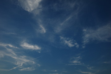 Obraz premium White fluffy clouds in the blue sky
