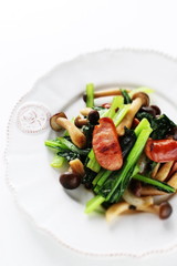 Japanese himeji mushroom and sausage still life with Komatsuna green leaf vegetable,