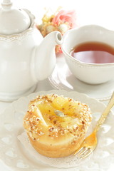 Homemade sweet apple Bun and tea