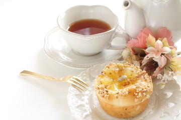 Homemade sweet apple Bun and tea