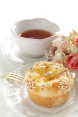 Homemade sweet apple Bun and tea