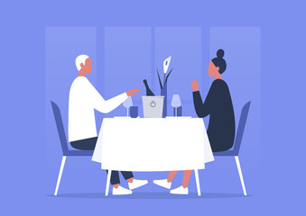 Fine dining restaurant, a couple of young adults having romantic dinner, anniversary celebration, first date or saint valentines day