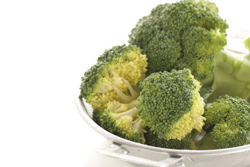 Prepared raw broccoli on pan for freshness ingredient