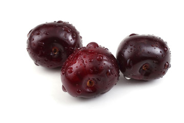 Wet dark red cherriies