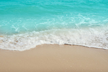 Fototapeta na wymiar Sea wave, beautiful beach, sand sun daylight, holiday summer concept