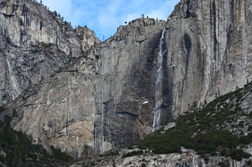 Fototapeta na wymiar Yosemite Falls and surrounding granite rock formations in Yosemite National Park, California in winter.