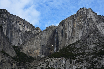 Yosemite Falls and surrounding granite rock formations in Yosemite National Park, California in winter.