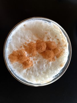 Top view of cappuccino isolated on black background