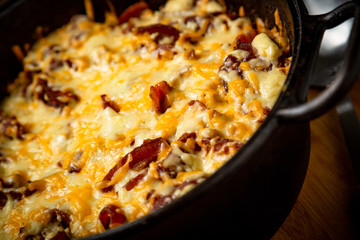 BBQ Side of Melted Mac and Cheese in a Cast Iron Bowl and Plated