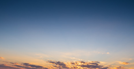 blue and sunset sky with clouds background.