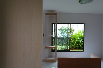 interior home office renovation, furniture built in with plywood material installing in a new house