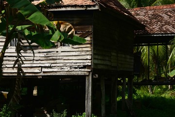 My old wooden house in Thai style used as wallpaper.