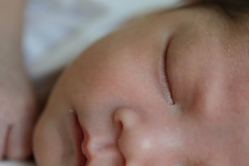 close up cute face of newborn baby softness sensitive skin