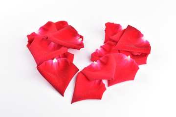 red broken heart of rose petal flower isolated on white background, abstract symbol heartbroken of love problem