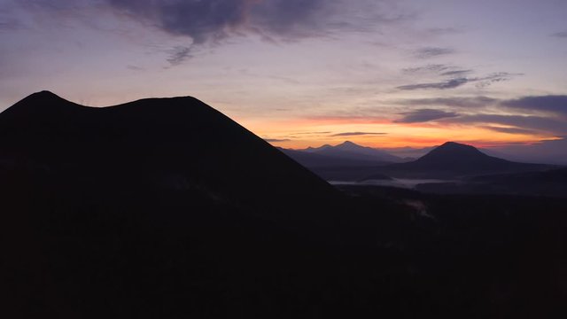 Aerial drone shot of volcano at sunrise