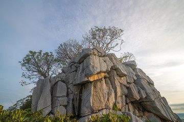 Fototapeta premium The scenery of the limestone cliff at the peak of Khao Nor in the morning at Nakhon Sawan, Thailand.