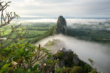 The scenery of Khao Nor covered by the mist in the morning at Nakhon Sawan, Thailand.