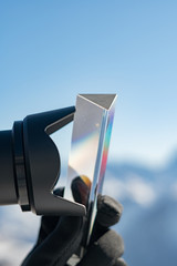 Close up view of professional photographer taking picture with triangle glass prism. Photography...