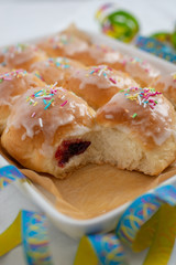 Traditional Polish donuts on wooden background. Tasty doughnuts with jam