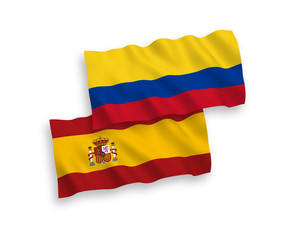 Flags of Colombia and Spain on a white background